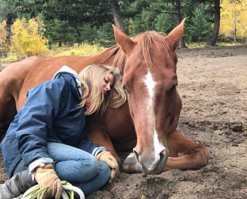 travi and Lea relax in field